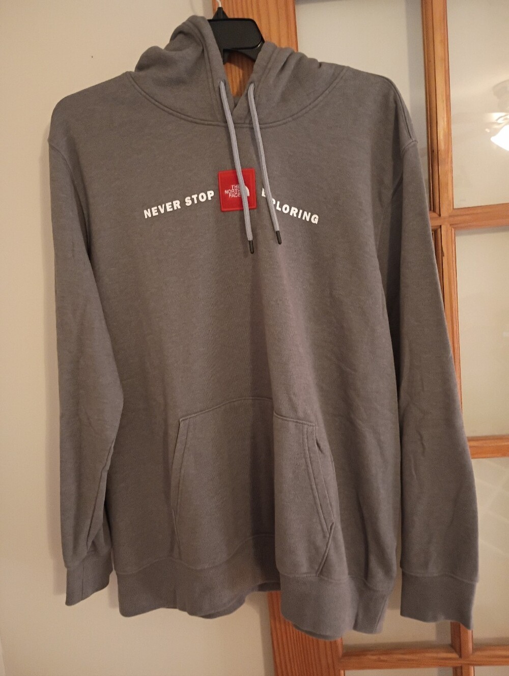 The North Face Gray Pullover Hoodie with Red Logo